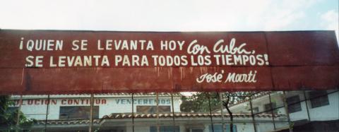 AE_1_12.jpg - Sign in the campamento [Who wakes up to Cuba today wakes up all the time - Jose Marti]