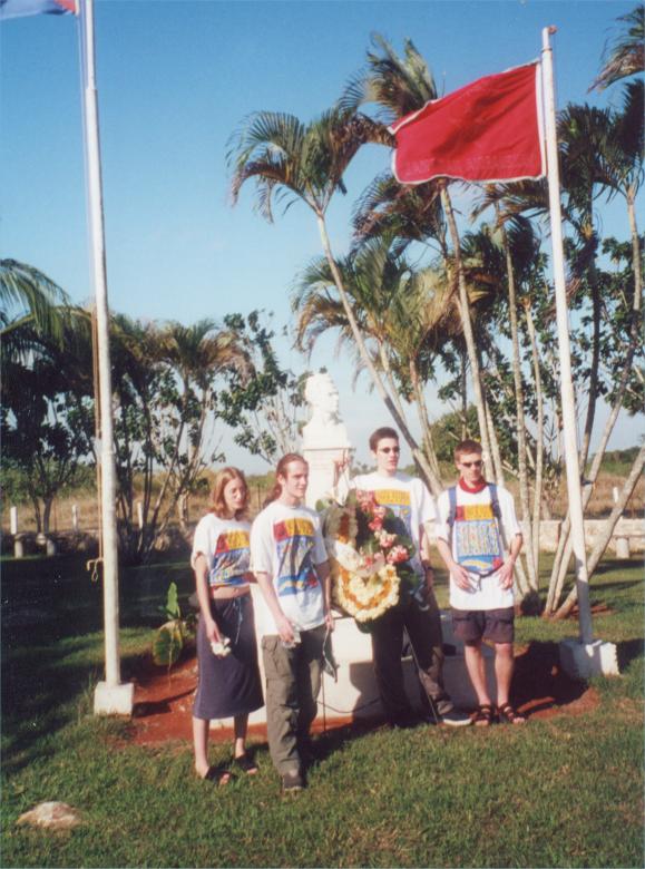 AE_2_12.jpg - The posse who went to the same school together in front of Jose Marti and the Cuban flag